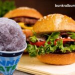 burger and a grape snow cone